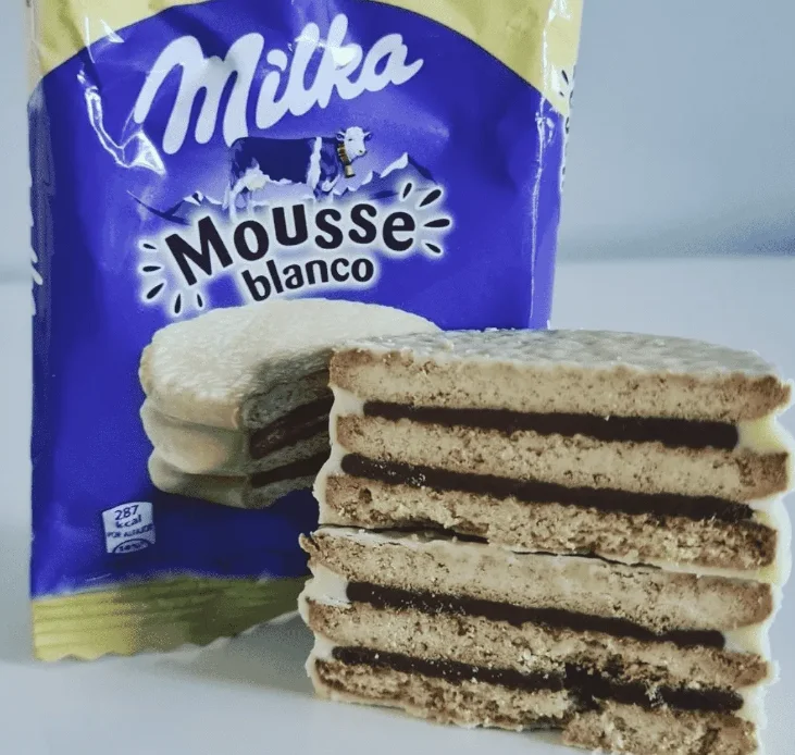 Alfajor Argentino Milka Mousse Blanco 55g - Cobertura de Chocolate Branco dos Alpes
